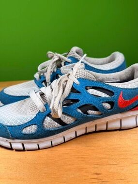 Nike Blue and Light Gray Women Athletic Sneakers with Red Swoosh
